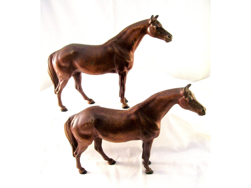 Appraisal: Pair of Cast Iron Figural Horses Measures high and long