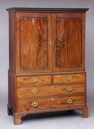 Appraisal: GEORGE III MAHOGANY LINEN PRESS The molded cresting with Greek