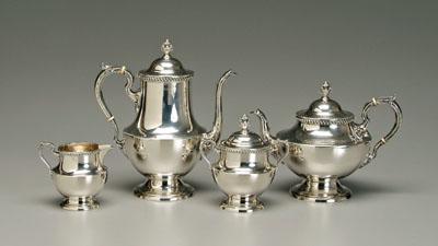 Appraisal: Four-piece sterling tea service urn form gadroon borders urn and