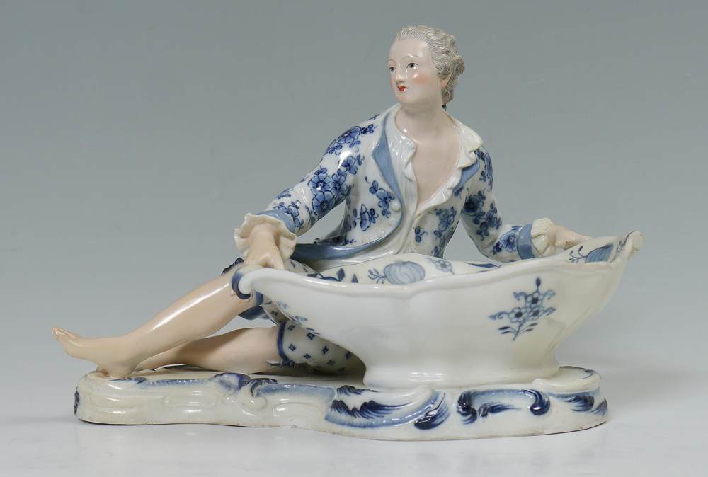 Appraisal: MEISSEN FIGURAL BLUE ONION SWEET MEAT DISH Figure of a