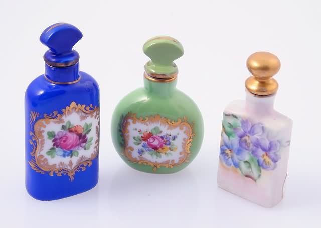 Appraisal: Circa 's two Dresden bottles apple green ad blue backgrounds