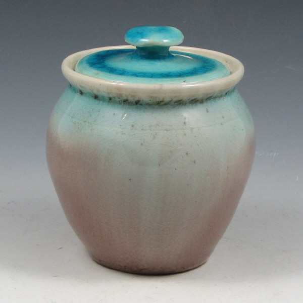 Appraisal: Pisgah Forest lidded jar in blue fading to lavender high