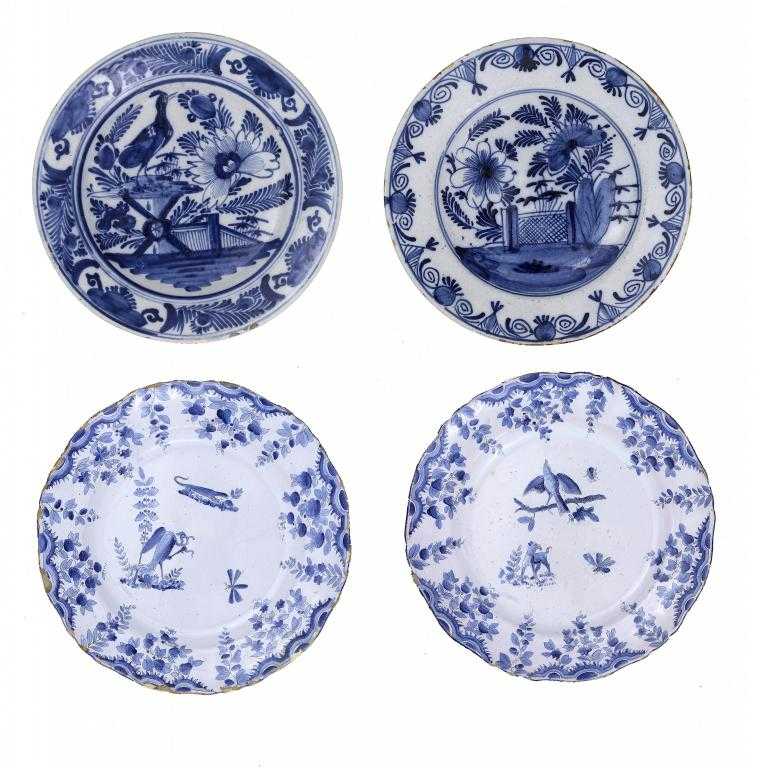 Appraisal: A PAIR OF FRENCH FAIENCE PLATES painted in cobalt and