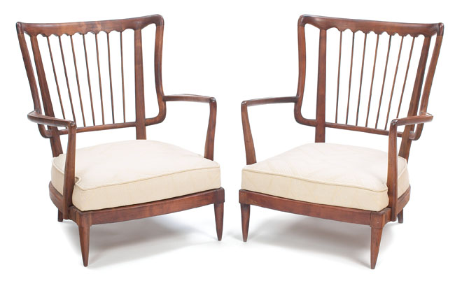 Appraisal: Italian Modernist lounge chairs pair designer unknown sculptural walnut frames