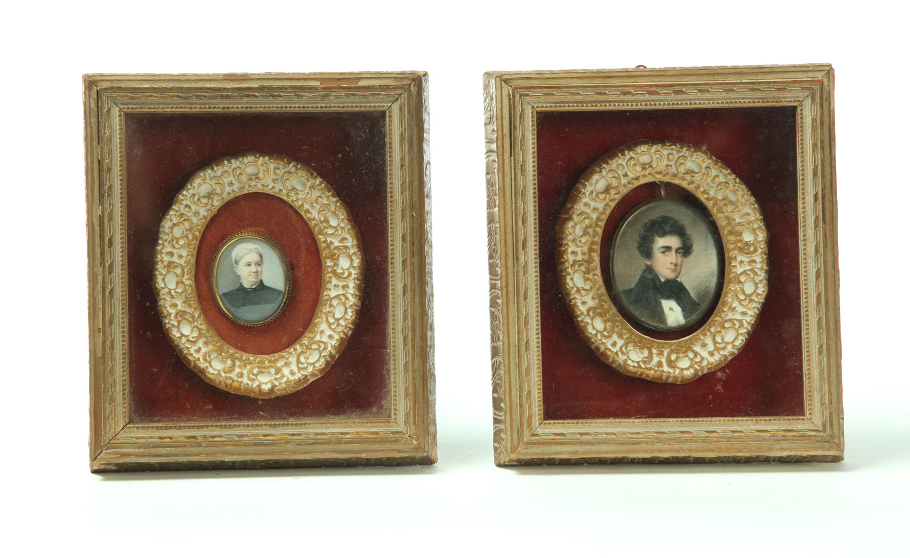 Appraisal: TWO MINIATURE PORTRAITS ON IVORY American th century Earlier portrait