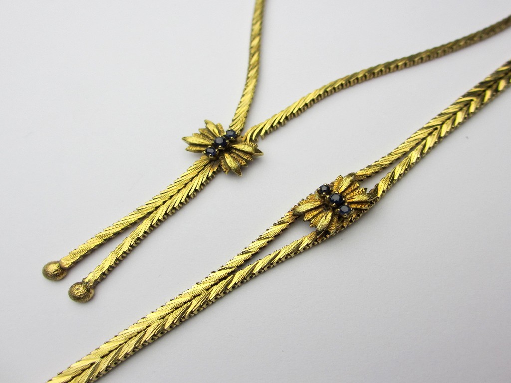 Appraisal: An eighteen carat gold sapphire set necklace and bracelet set