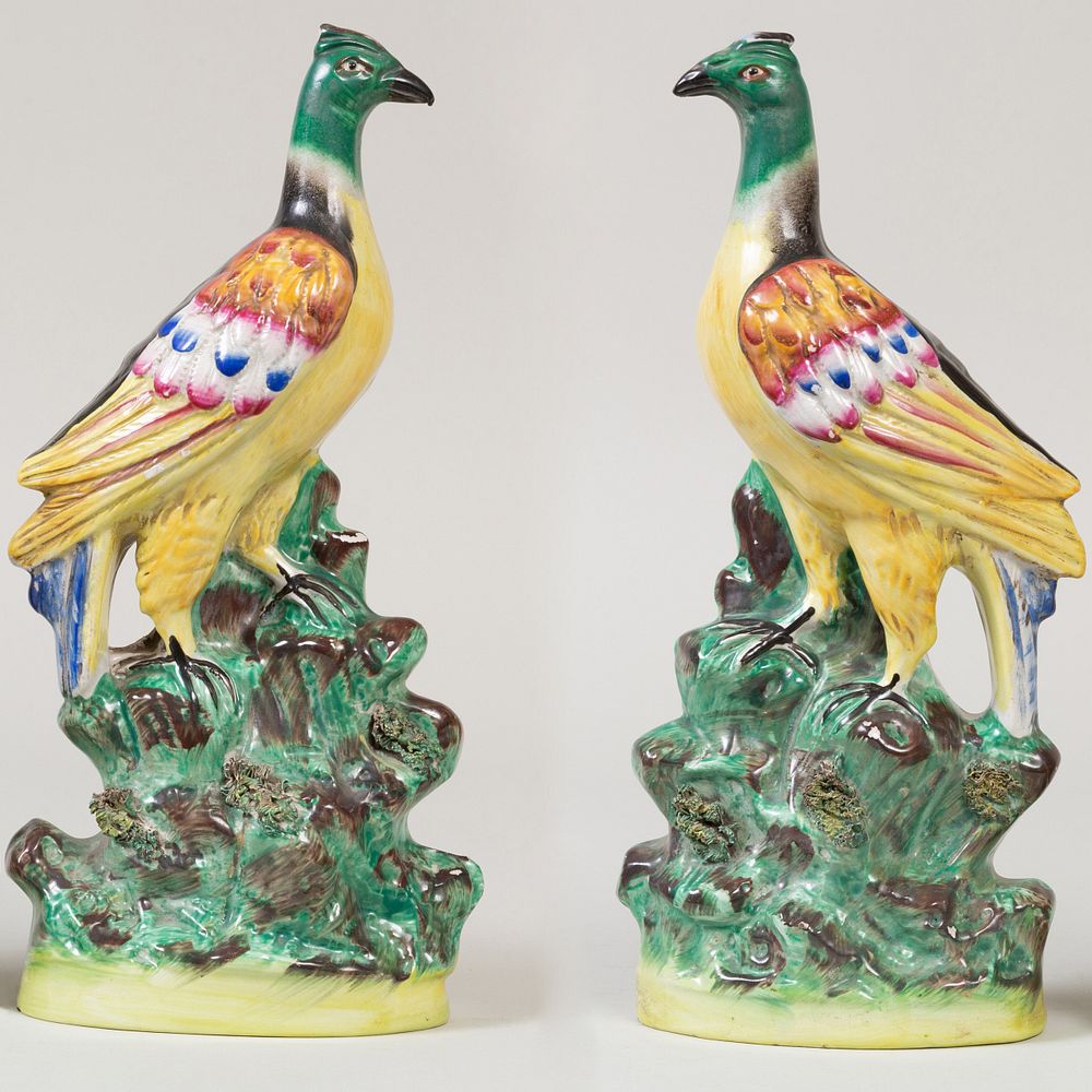 Appraisal: Pair of Staffordshire Pottery Models of Pheasants in high Property