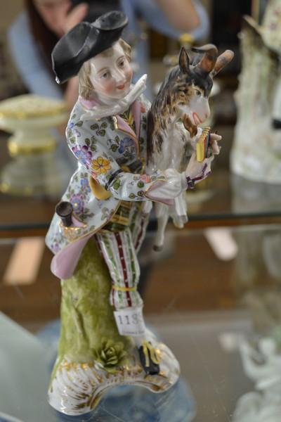 Appraisal: MEISSEN STYLE FIGURE BOY WITH GOAT LOSSES AND REPAIRS A