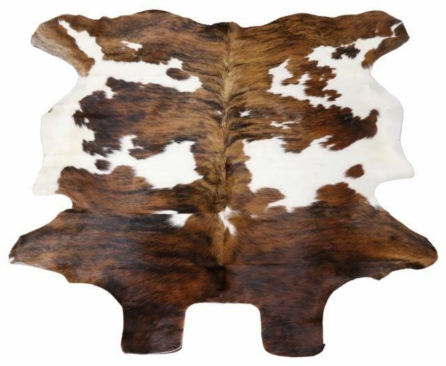 Appraisal: Cowhide white brown black largest measurements approx x