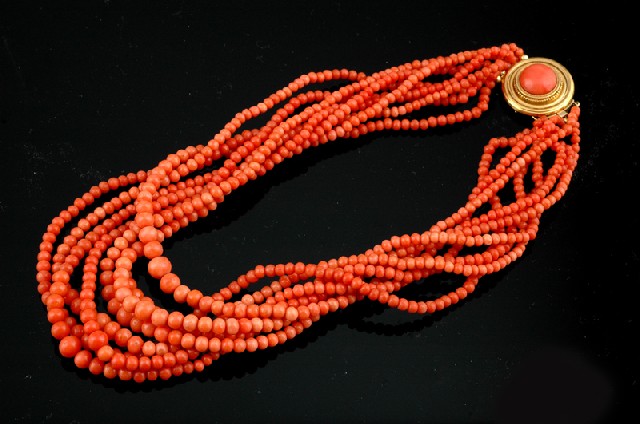 Appraisal: A MULTI STRAND CORAL NECKLACE The eight graduated strands of