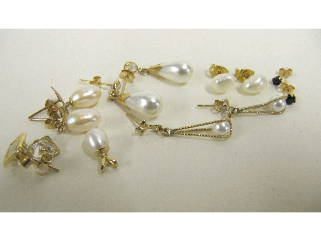 Appraisal: Four pairs of gold mounted pearl earrings pearl pendant cz