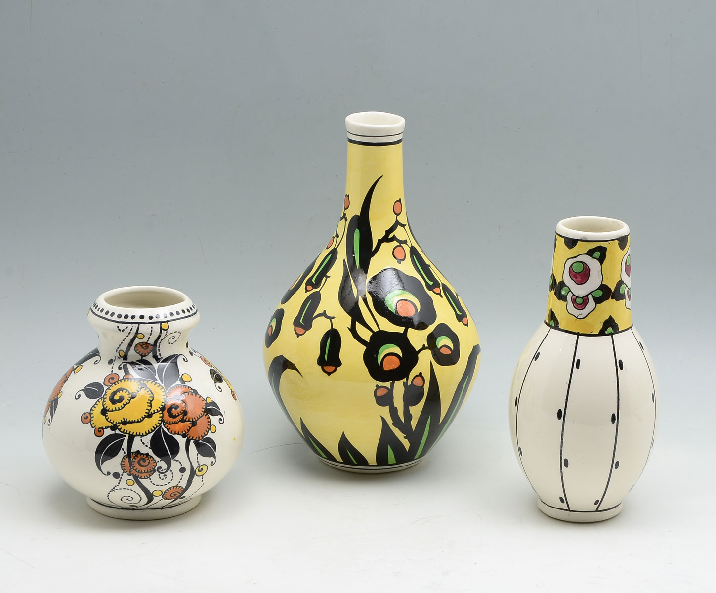 Appraisal: PC BOCH FRERES FLORAL MOTIF VASES Comprising - Yellow ground