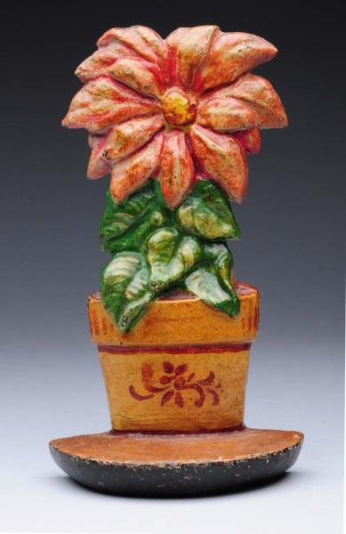 Appraisal: Cast Iron Poinsettia Doorstop Hubley s version of the Poinsettia