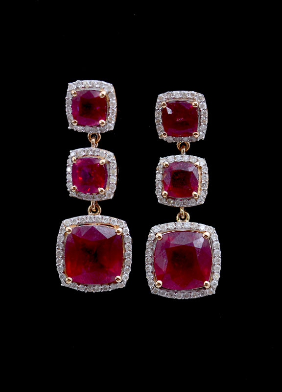 Appraisal: K CTW RUBY AND DIAMOND EARRINGS square cushion mixed cut