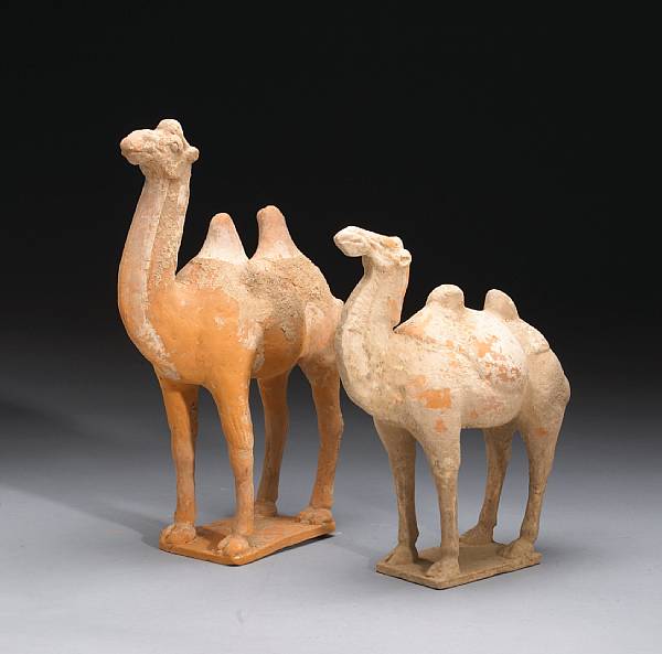 Appraisal: Two painted pottery funerary models of camels Tang Dynasty Each