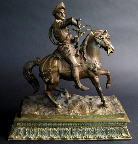 Appraisal: GERMAN GILT BRONZE FIGURE depicting a knight drawing his sword