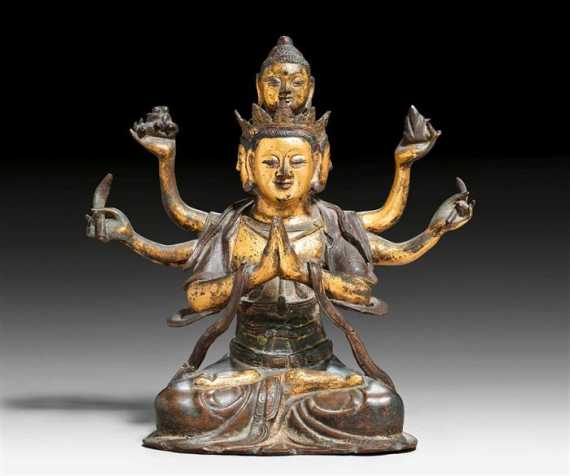 Appraisal: A RARE PARTLY GILT BRONZE FIGURE OF THE SIX ARMED