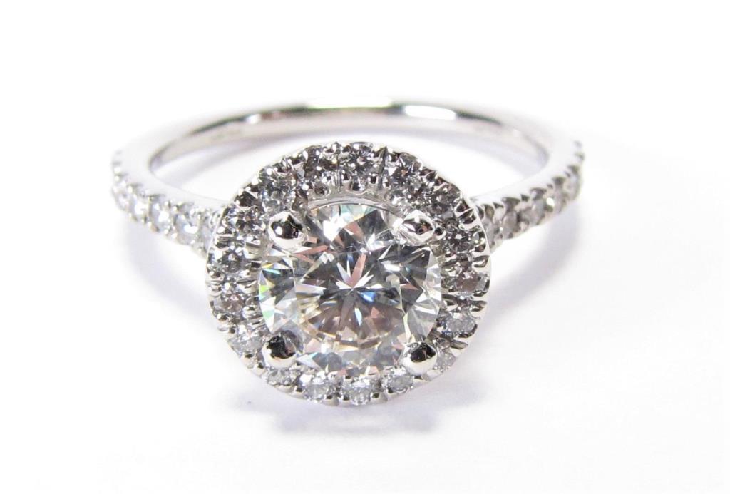 Appraisal: A lady's platinum halo style ring with a ct round