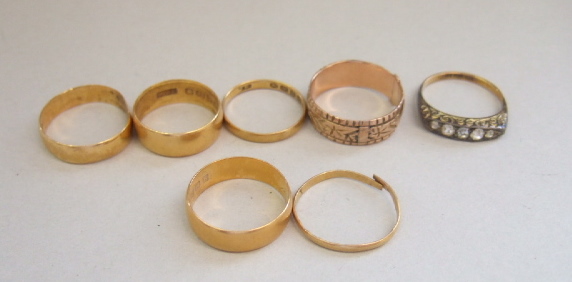 Appraisal: Five ct gold plain wedding rings a ct gold decorated