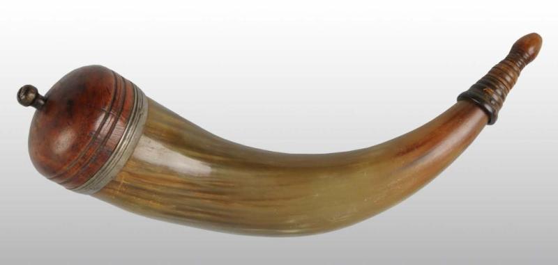 Appraisal: Early Powder Horn Description With original screw tip turned end-plug