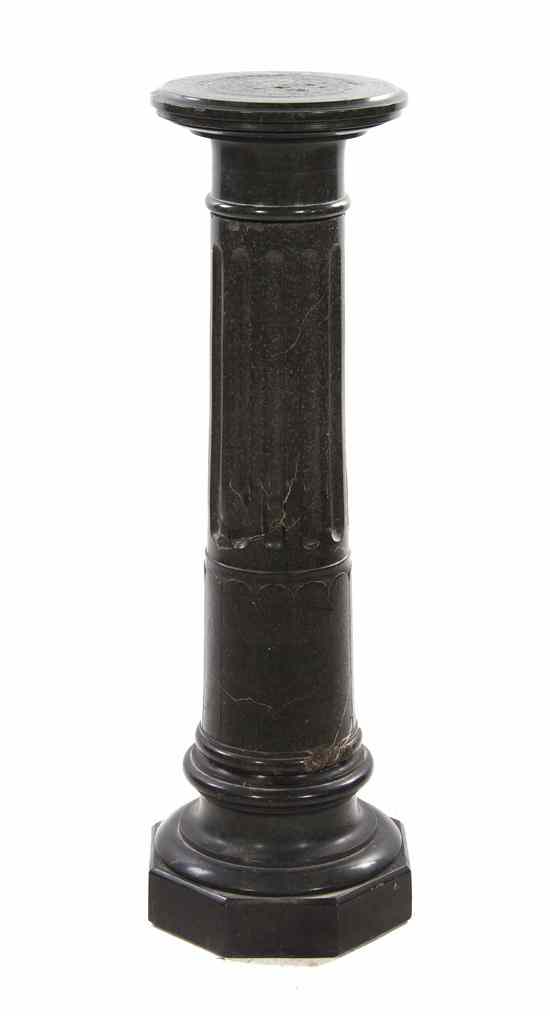 Appraisal: A Continental Marble Column having a circular top and fluted