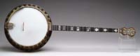 Appraisal: OUTSTANDING CARVED AND INLAID FOUR STRING BANJO BY VEGA Artist