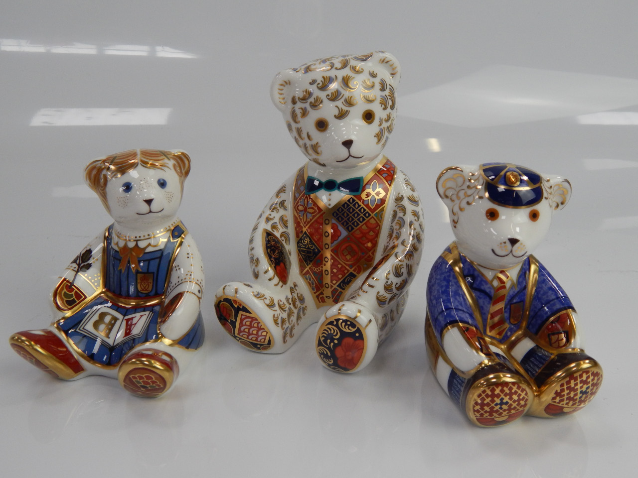 Appraisal: Three Royal Crown Derby teddy bear paperweights