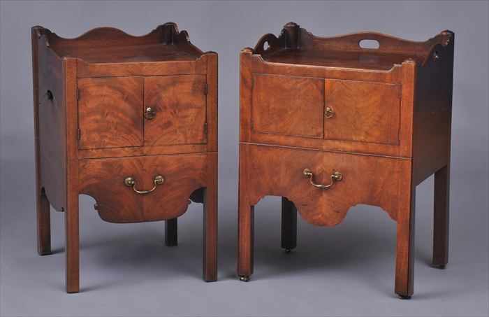 Appraisal: TWO SIMILAR GEORGE III MAHOGANY BEDSIDE CUPBOARDS Each with waved