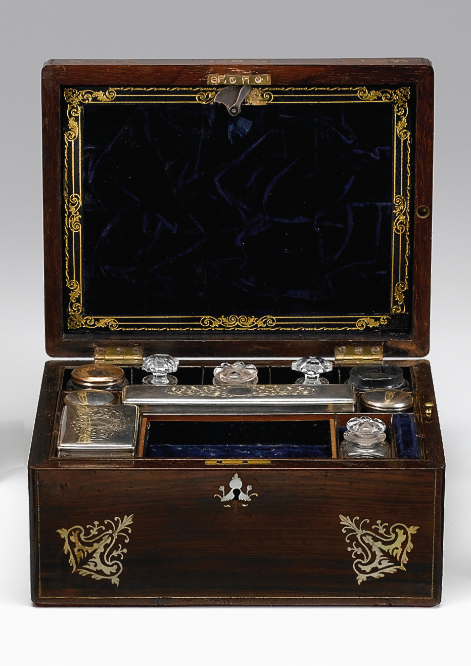 Appraisal: English mother-of-pearl inlaid rosewood traveling dressing box th century The