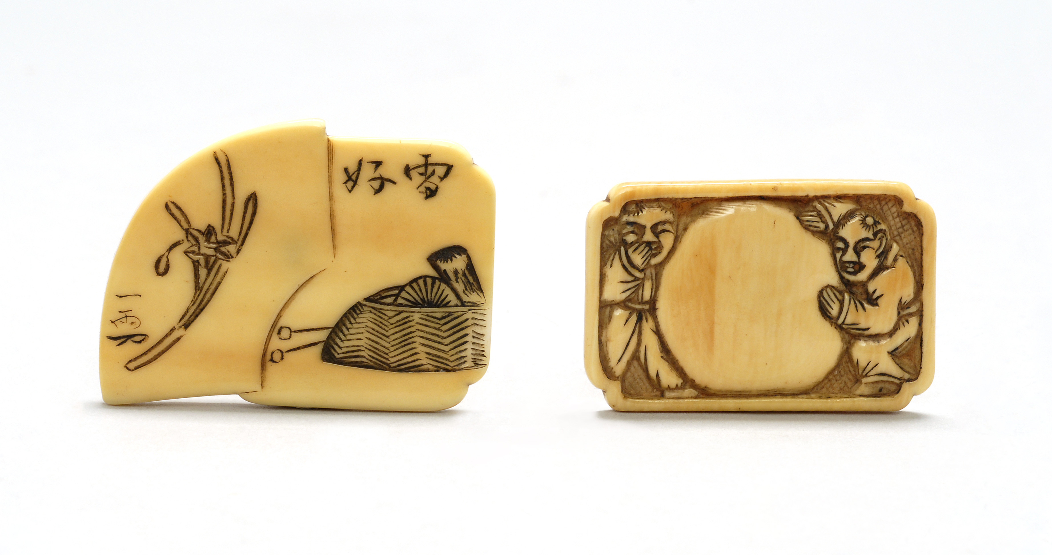 Appraisal: TWO IVORY MANJU th Century Rectangular form one depicting two