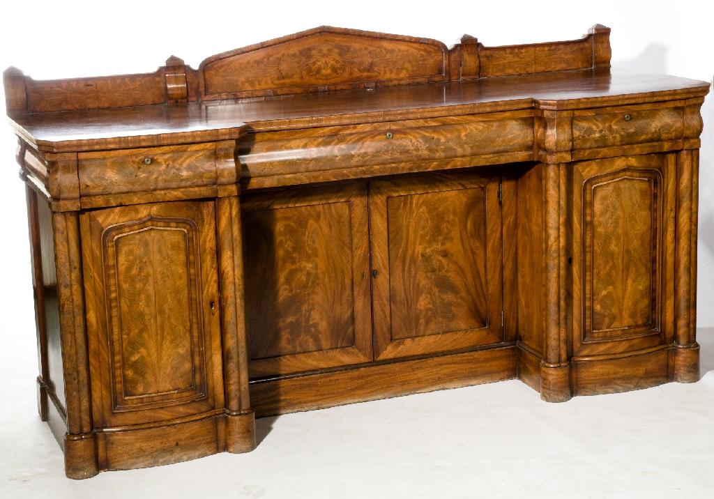 Appraisal: MID th CENTURY MAHOGANY INVERTED BREAKFRONT PEDESTAL SIDEBOARD the top