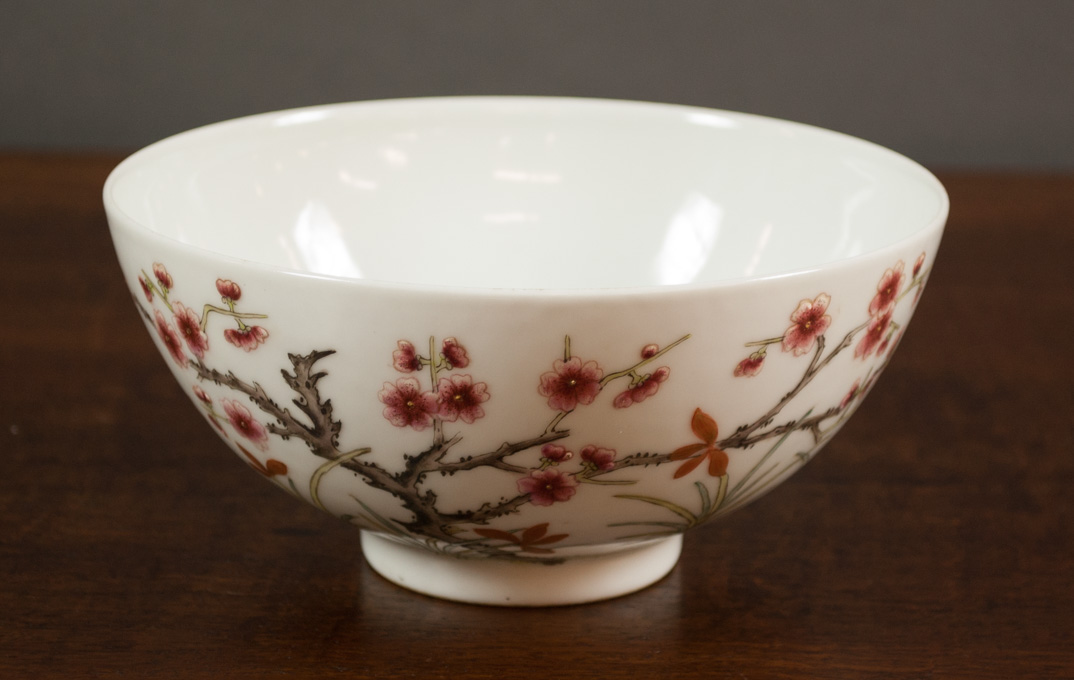 Appraisal: CHINESE QING FAMILLE ROSE PORCELAIN BOWL decorated with a hand