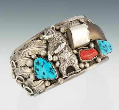 Appraisal: A Large Sterling Silver Bear Claw Turquoise and Coral Cuff