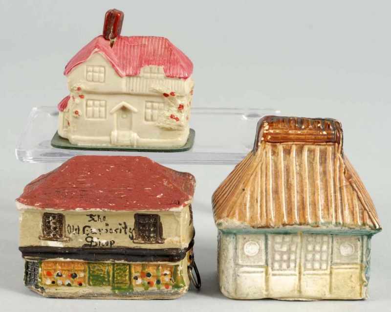 Appraisal: Lot of House Figural Tape Measures Description Spring tapes Two