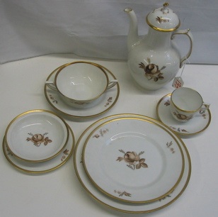 Appraisal: A PIECE ROYAL COPENHAGEN FINE DINNER SET in arose pattern