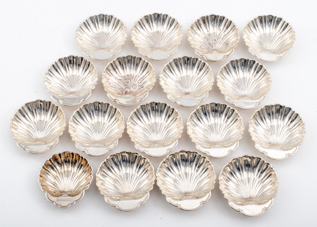 Appraisal: AMERICAN STERLING SILVER SHELL NUT DISHES Seventeen American sterling silver