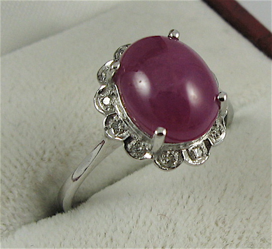 Appraisal: RUBY DIAMOND AND K WHITE GOLD RING centered and prong