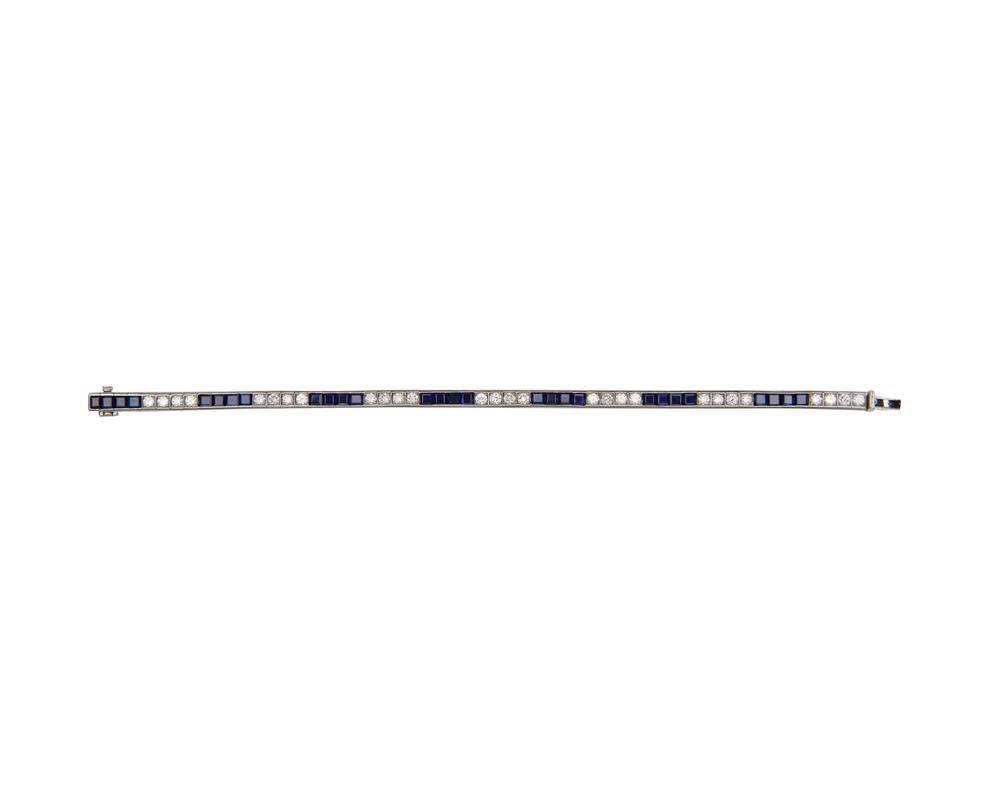 Appraisal: Platinum Diamond and Sapphire Line Bracelet comprising alternating groupings of