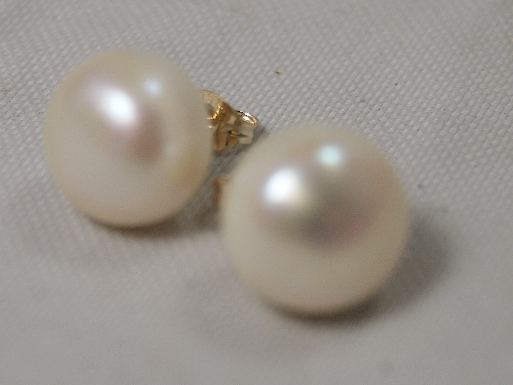 Appraisal: Pair of button cultured pearl studs