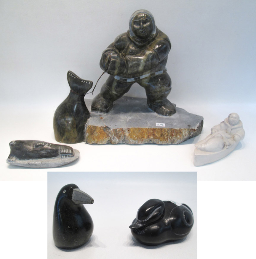 Appraisal: FIVE ESKIMO CARVED STONE FIGURAL SCULPTURES various size scenes and