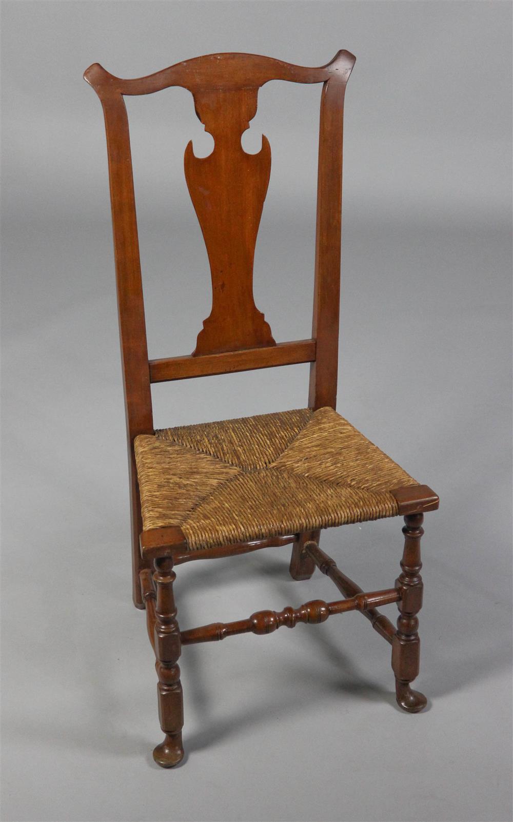 Appraisal: AMERICAN PROVINCIAL CHERRYWOOD SIDE CHAIR with a shaped crest rail