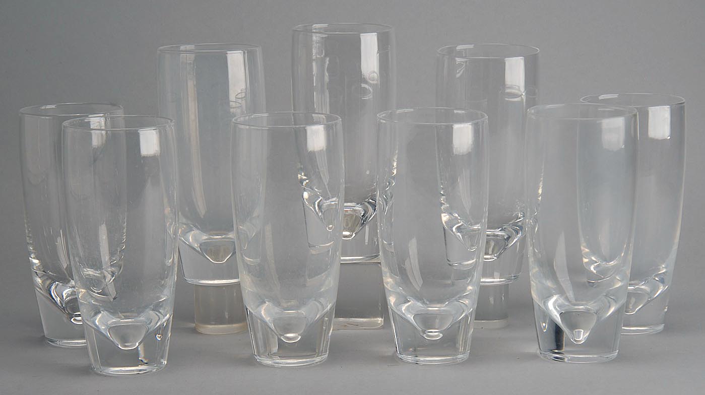 Appraisal: NINE STEUBEN TALL GLASSES Several marked S on bottom ConditionSome