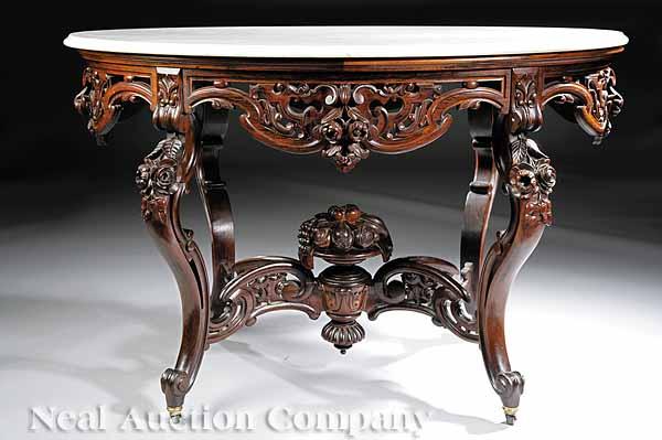 Appraisal: An American Rococo Laminated and Carved Rosewood Center Table attributed