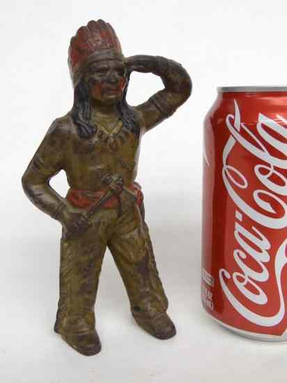 Appraisal: th c cast iron Indian Chief with tomahawk still bank