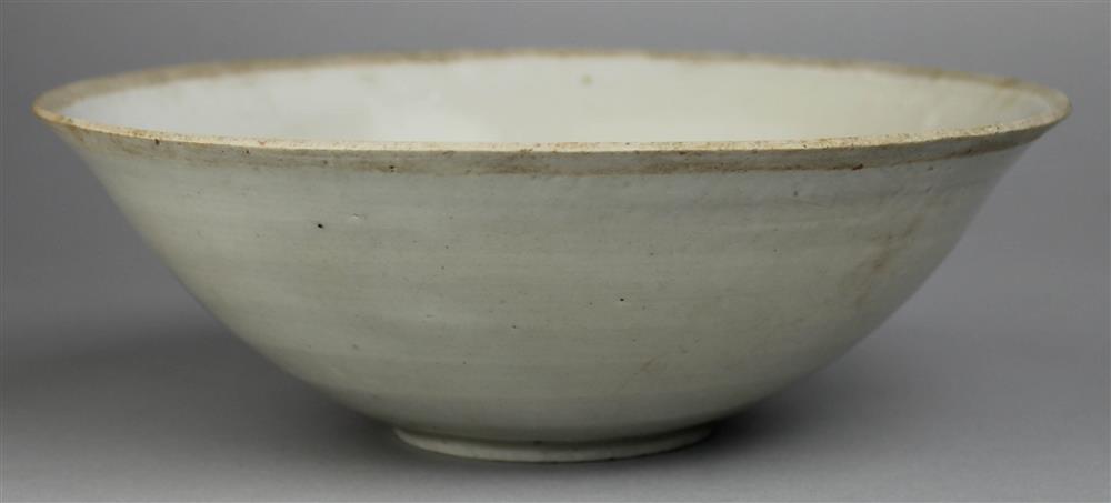 Appraisal: CHINESE QINGBAI MOLDED BOWL SONG DYNASTY OR LATER the thin