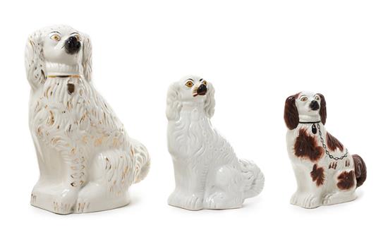 Appraisal: Sale Lot A Group of Three Staffordshire Dogs of various