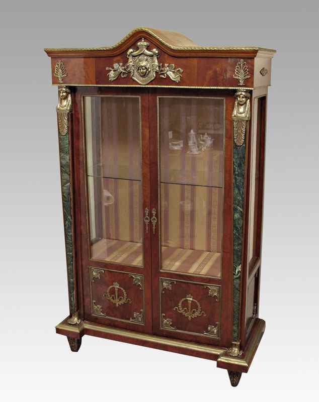 Appraisal: FRENCH ORMOLU DISPLAY CABINET Featuring masquerons over green marble stiles