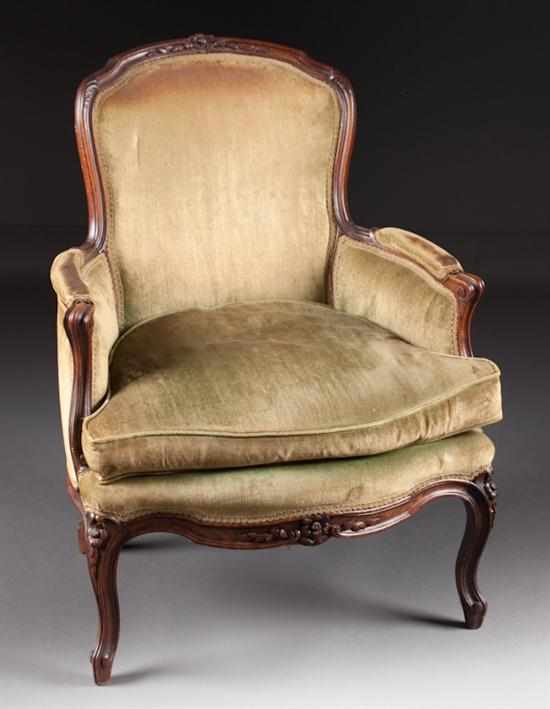 Appraisal: Louis XV style carved beechwood upholstered bergere en cabriolet late