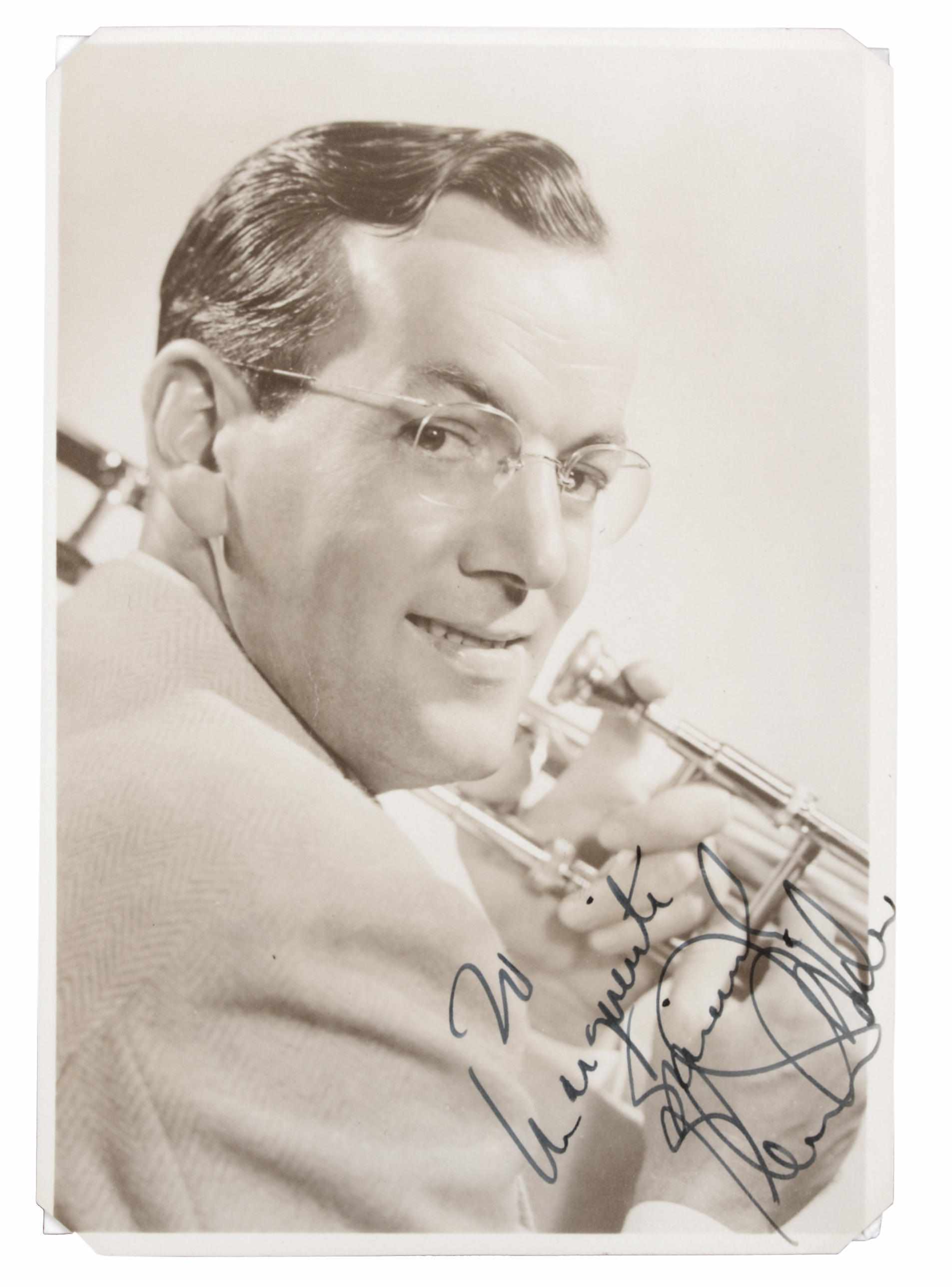 Appraisal: Glenn Miller signed photograph A vintage sepia tone portrait of