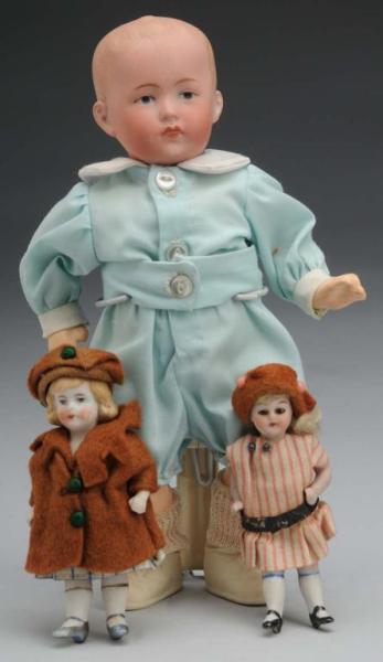 Appraisal: Lot of German Bisque Dolls Description Ca Character boy with